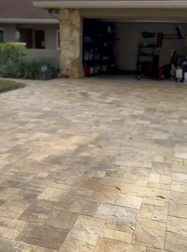 paver driveway with matching walkway path